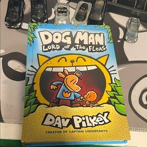 Dog Man: Lord of the Fleas by - Blue and Yellow Cover